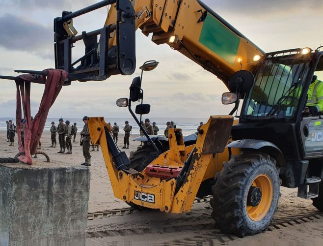 TELEHANDLER ON BEACH